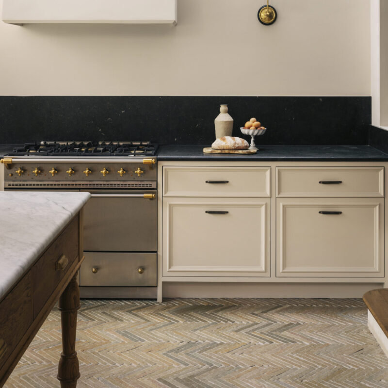 Lapicida Bordeaux Argento Herringbone flooring in kitchen. Image: Anna Batchelor, Design: Charles Tashima Architects