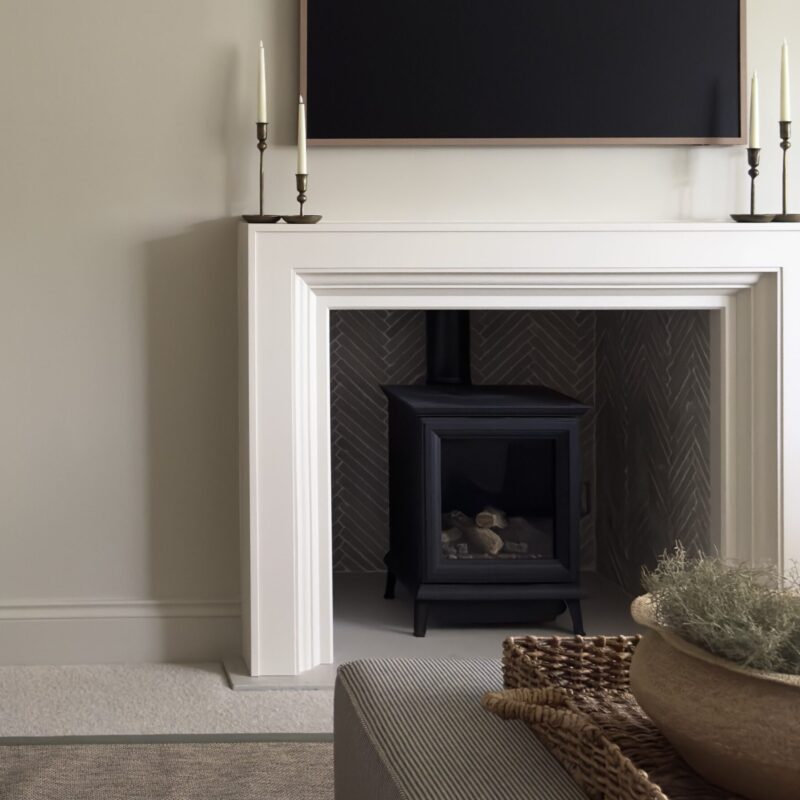 LAPICIDA Bordeaux Argento Herringbone tiles around wood burner stove by Rachael Somerville