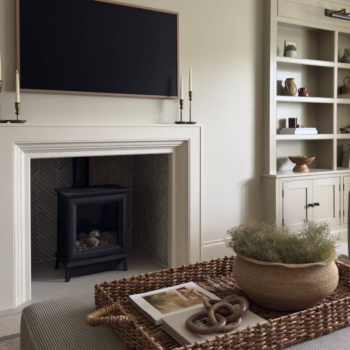 Lapicida herringbone tiles around log burner by Rachael Somerville Interiors